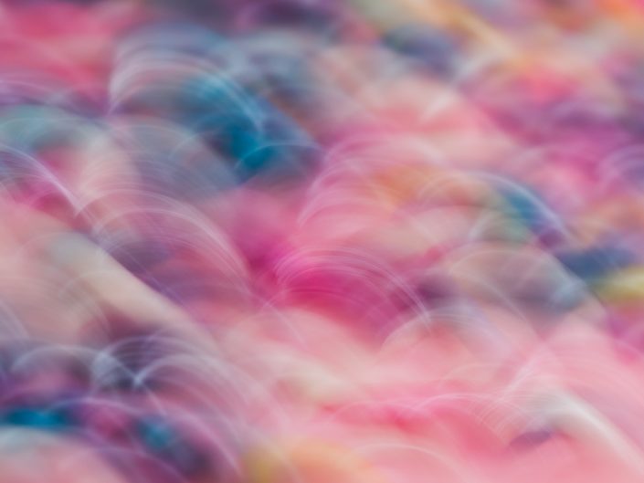 macro abstract image of pink and other colors using camera movement