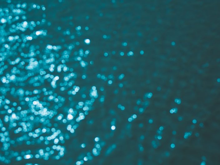 abstract image of turquoise blue water with bokeh